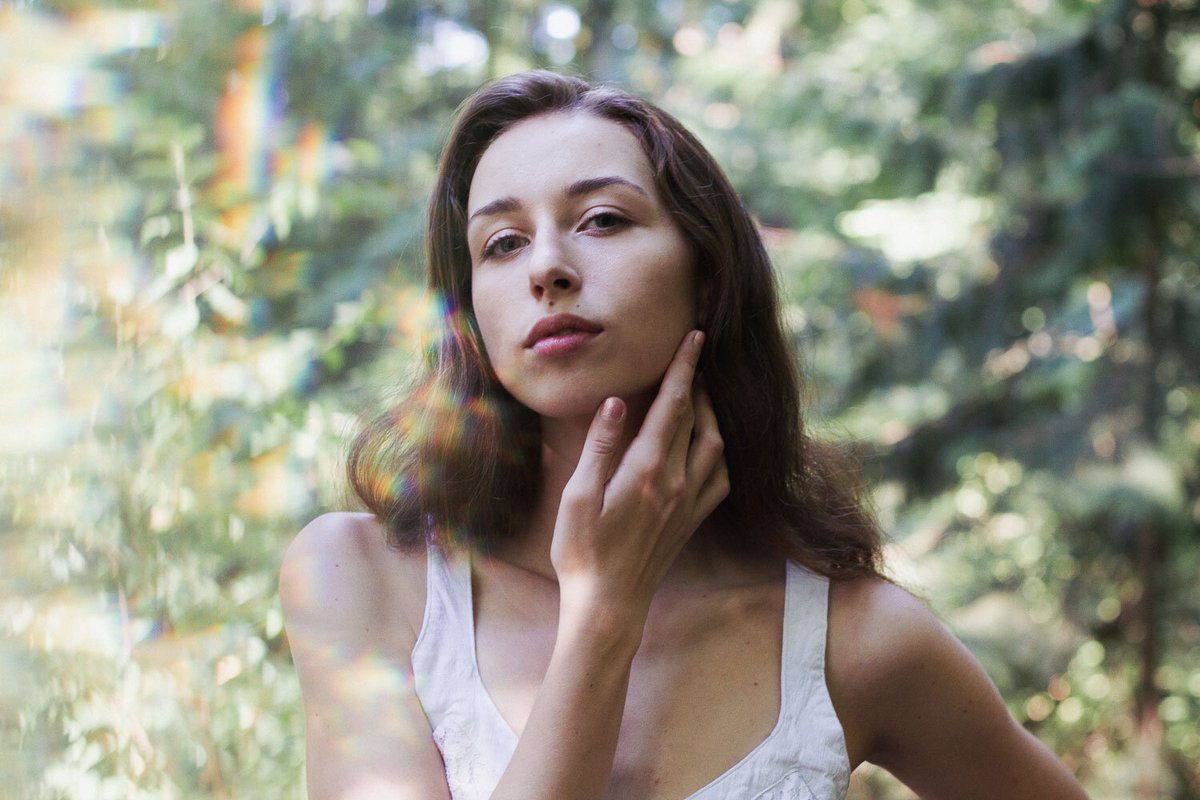 Model posing in a forest