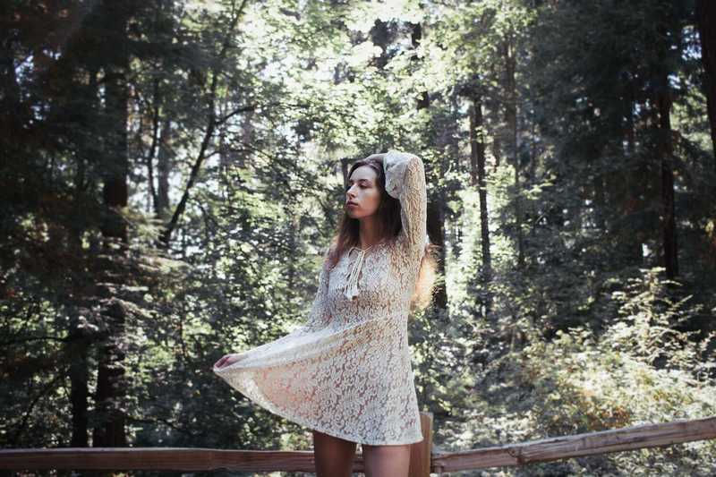 Model posing in a forest