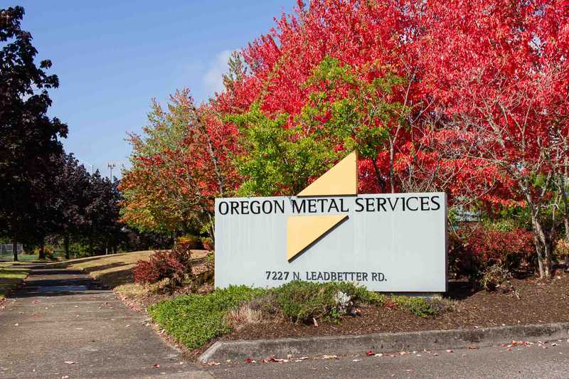 Company sign in front of the Oregon Metal Services building