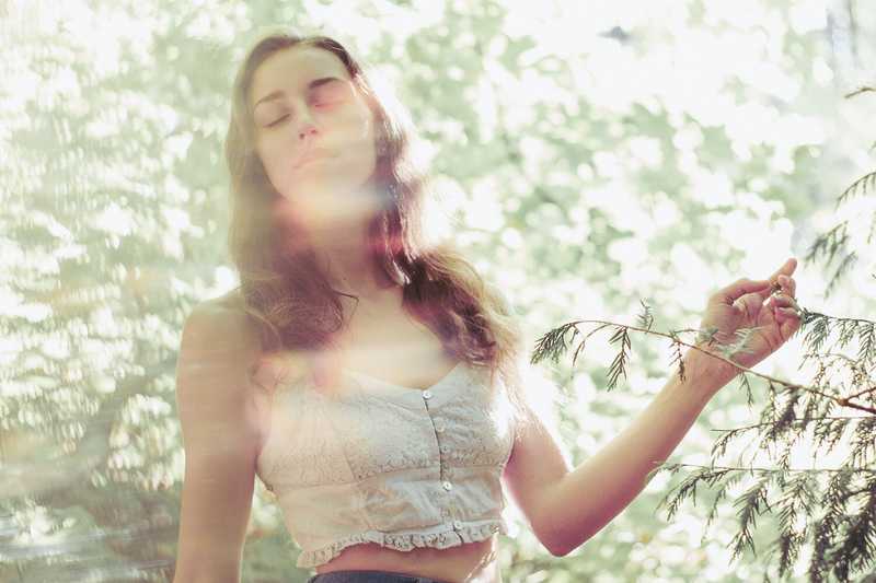 Model posing in a forest